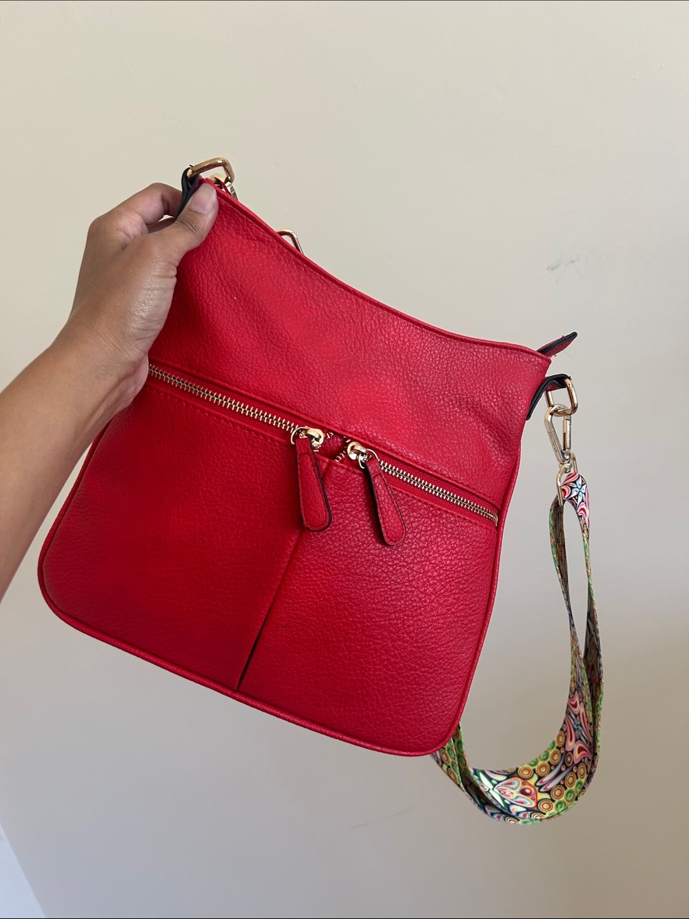 Red Pebbled Crossbody Bag with Psychedelic Strap
